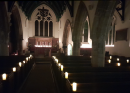 St Helen lit by candles